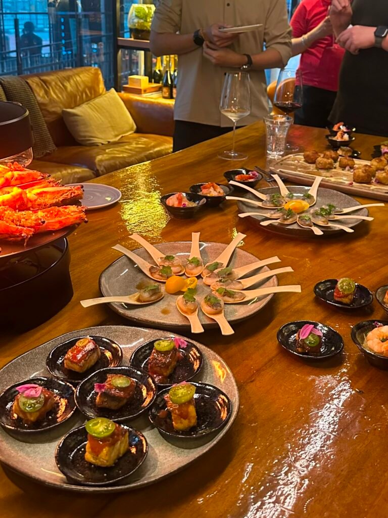 Elegant dining setup with gourmet appetizers on wooden table
